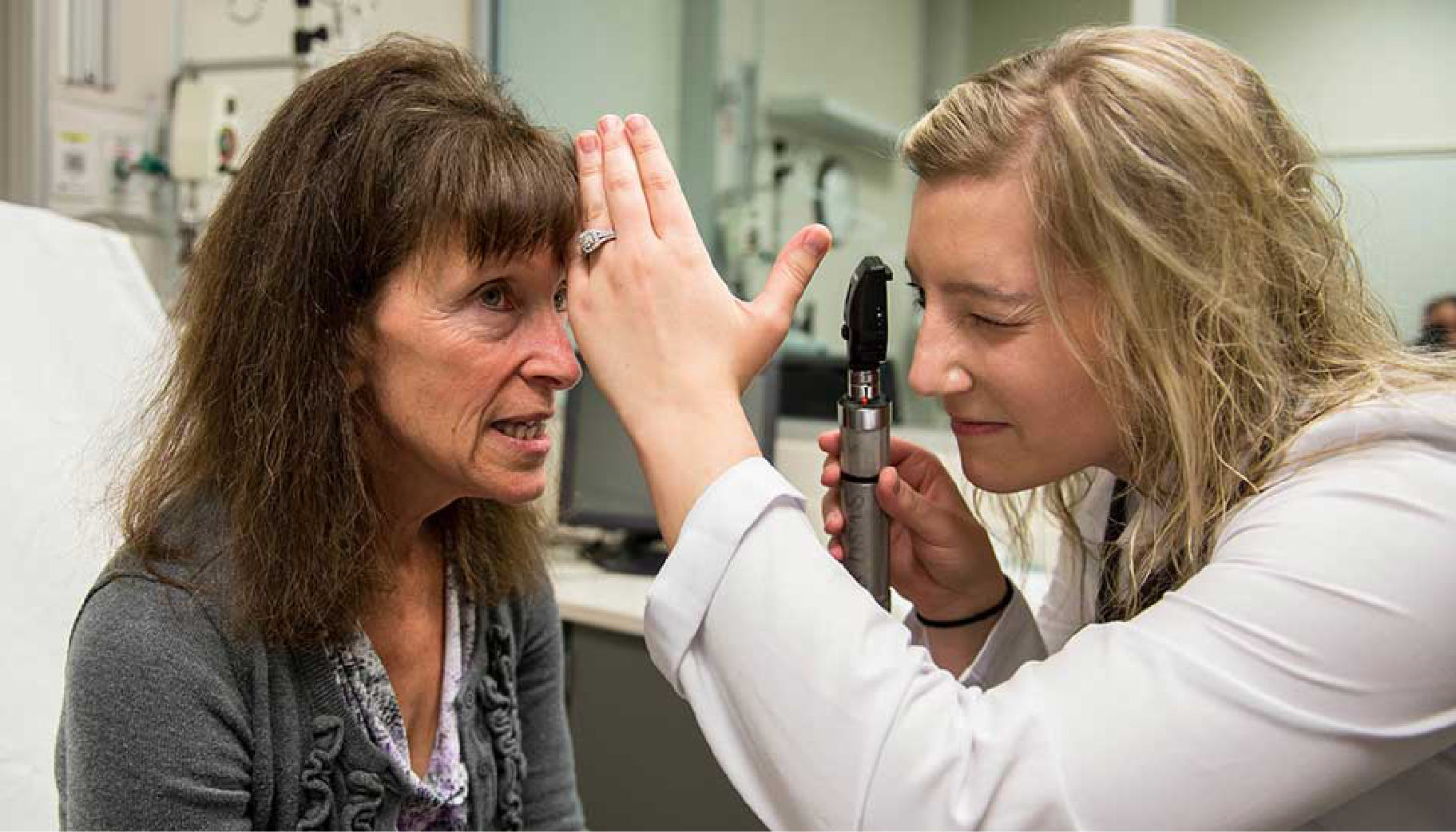 A nursing student ear being examined
