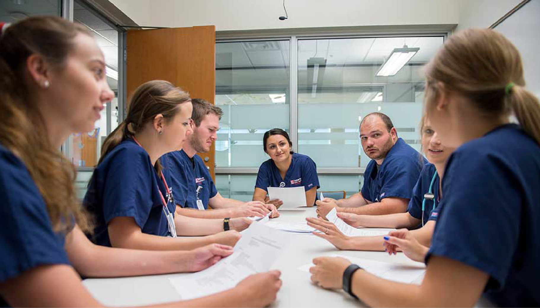Nursing students talking in a group