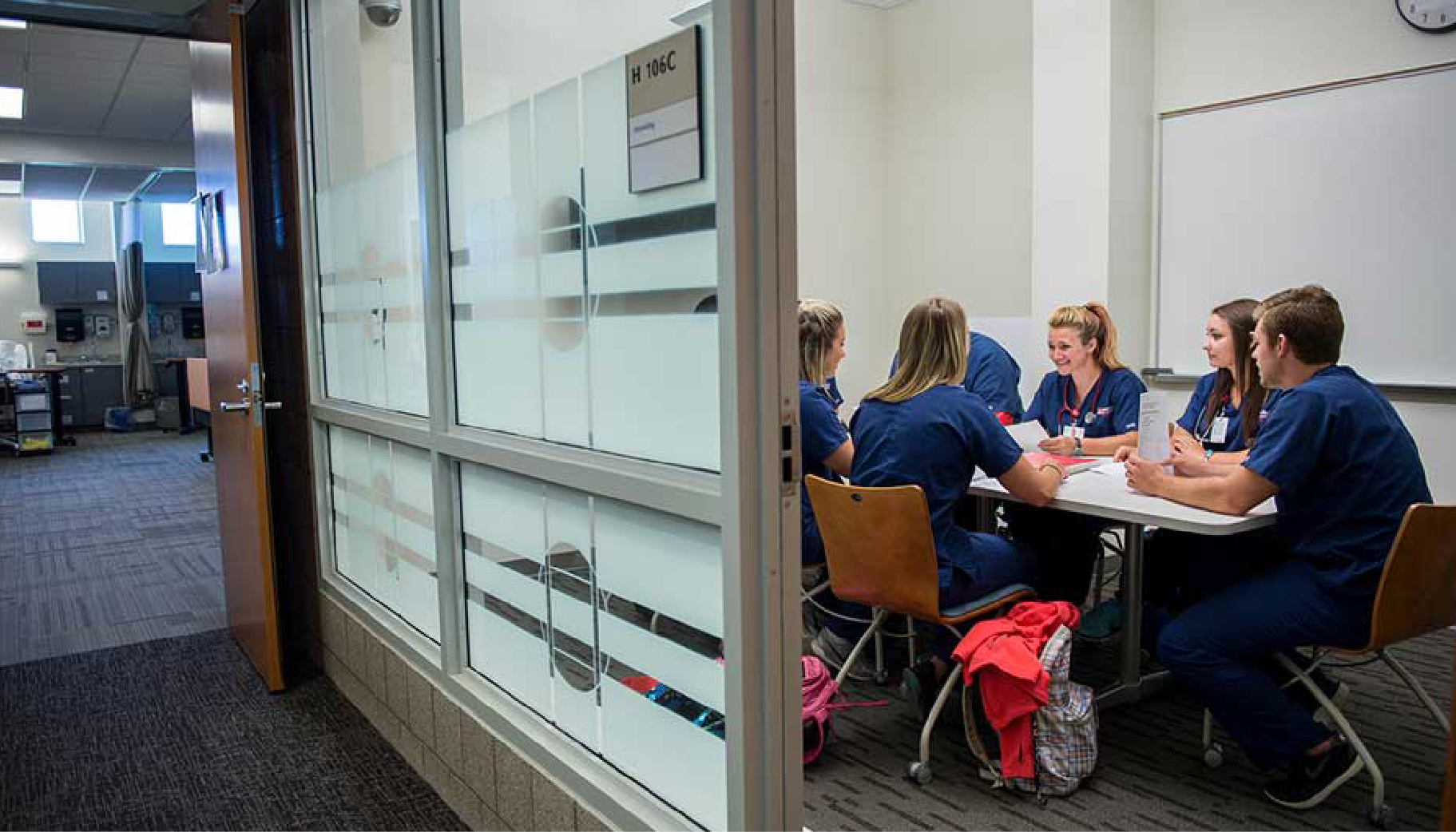 Nursing students talking in a group