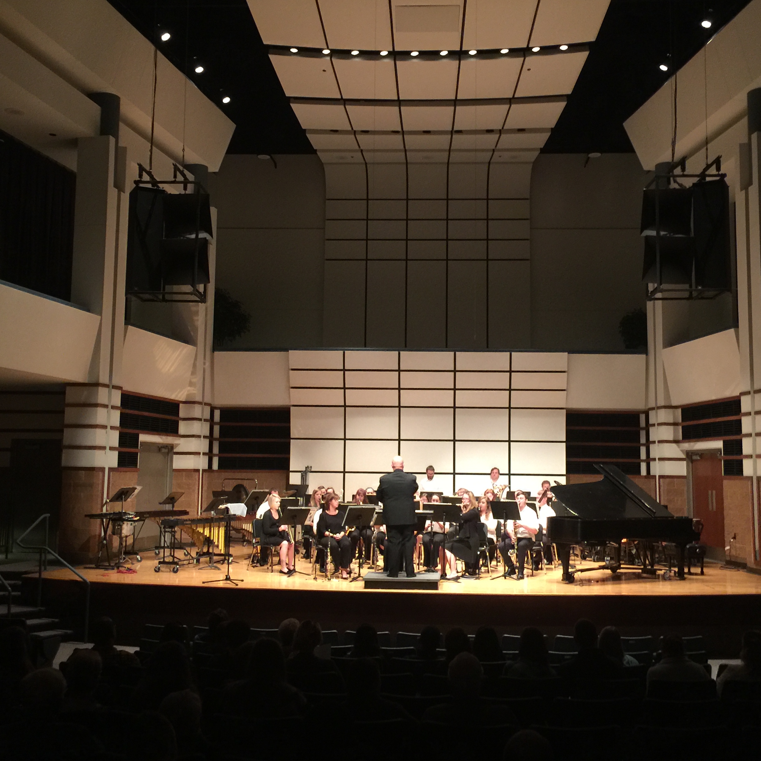 wind ensemble performing in the Rhea Miller Theatre