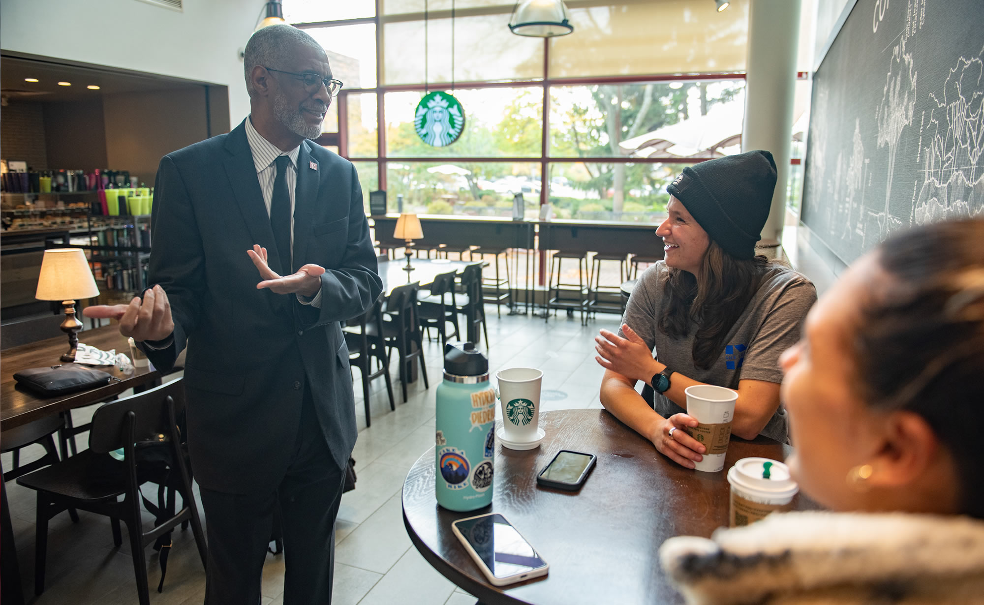George Grant meeting with students in Starbucks
