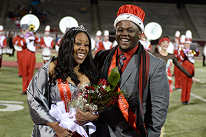 Photo of SVSU students Charnae Keith, left, and Brandon Jones immediately following their coronation as 2015 Homecoming king and queen. (Photo courtesy Mike Randolph, SVSU)