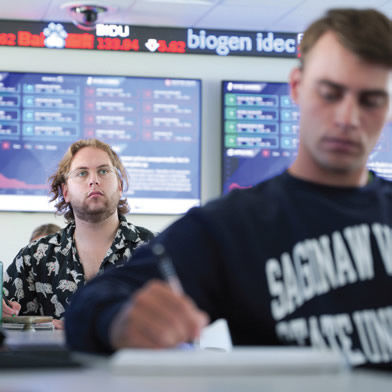 Two students in the Bloomberg room