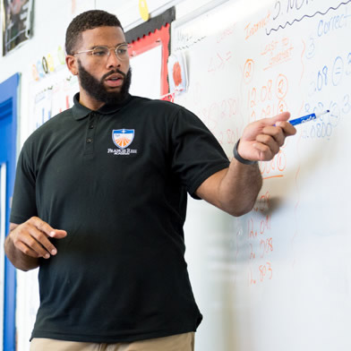 SVSU teaching alum in classroom
