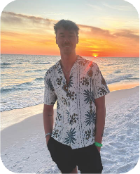 Riley Messing outside at sunset