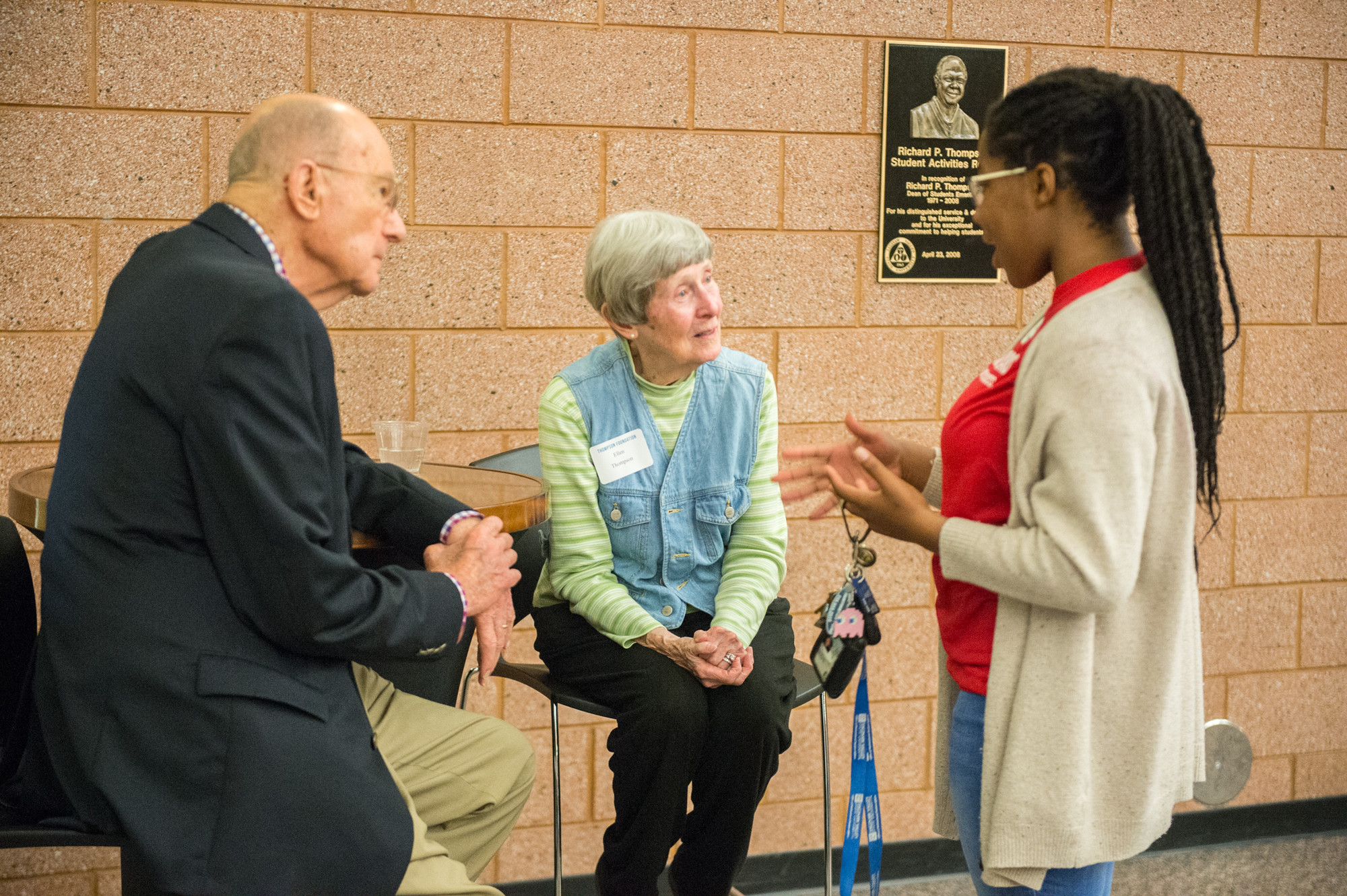 Thompson family talking with student