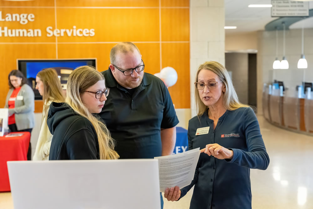 Parent and student meeting with admissions
