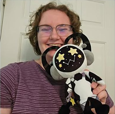 Paige Goodall with Plushie