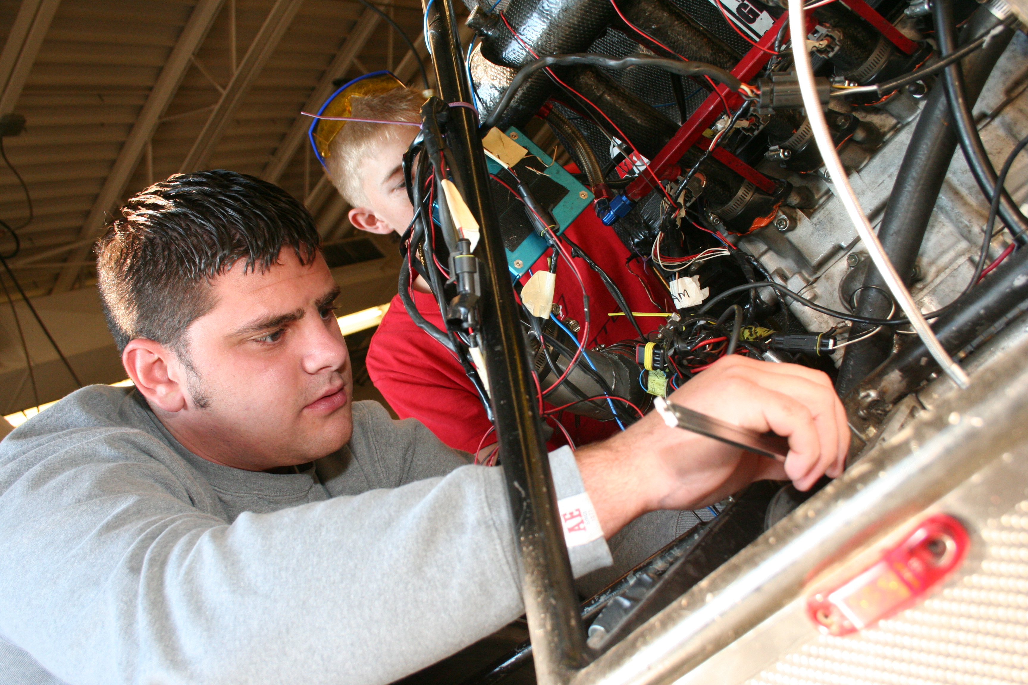 Students working on the race car