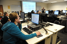 Students work in a computer lab.