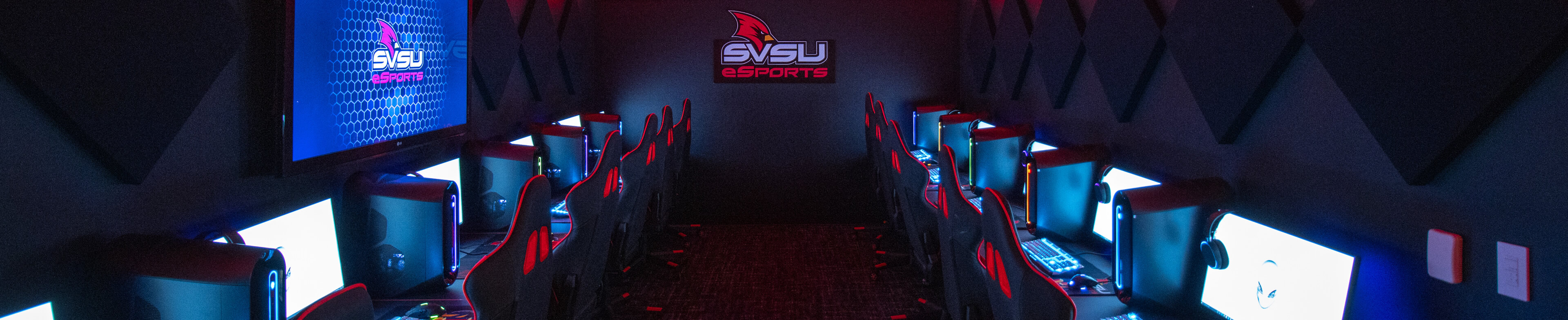 eSports room with computers lined up and large screen