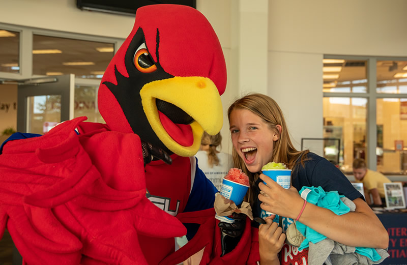 Coop the mascot with a student