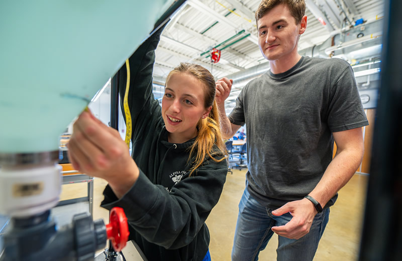 Engineering students working on project
