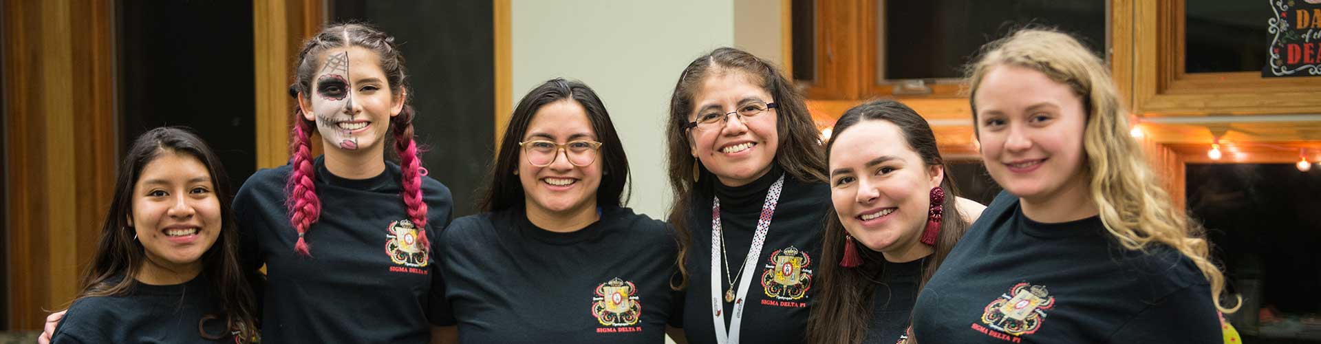Dr. Colorado-Garcia and students at Day of the Dead event