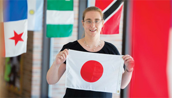 Monika Dix holding the flag of Japan!