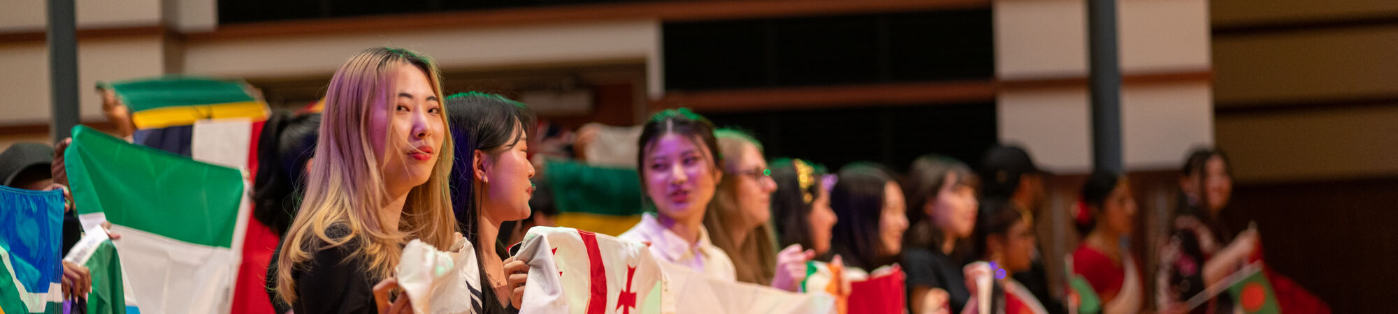 Students Holding International Flags