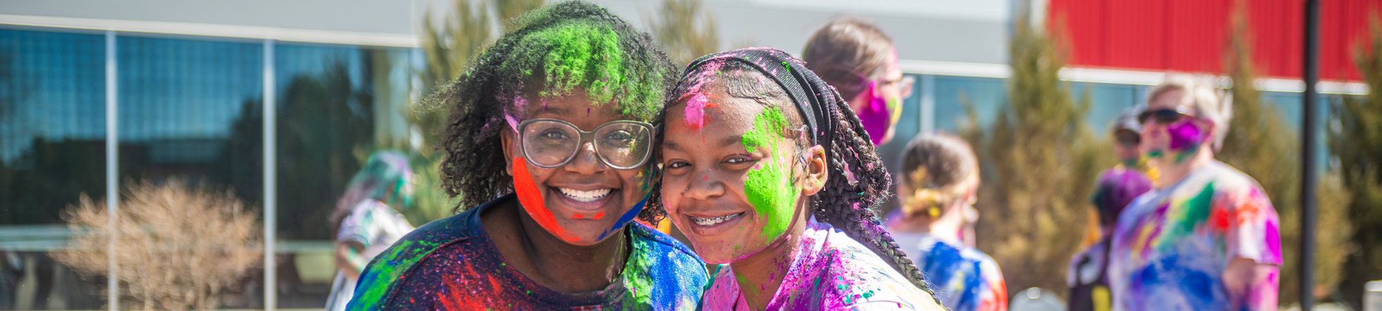 Students Throw Colored Powder In The Air