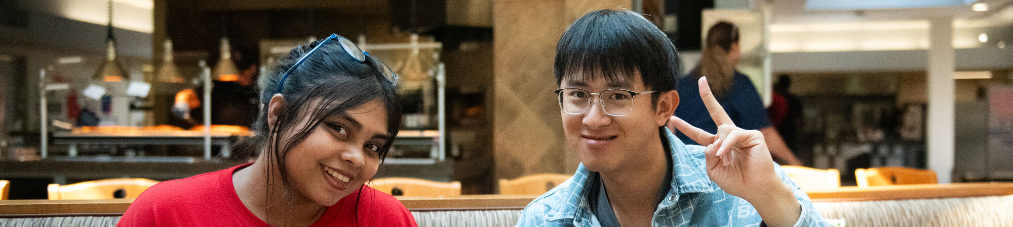 International Students Pose In Dining Hall