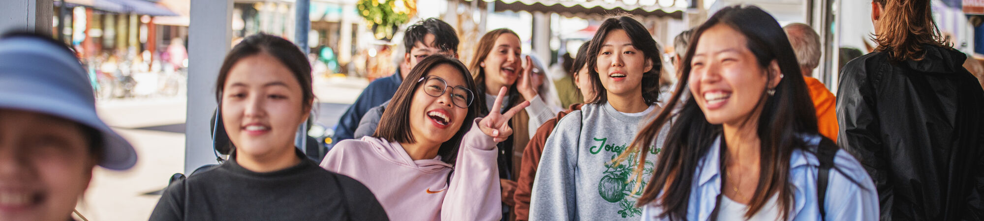 International Students Smiling On A Trip