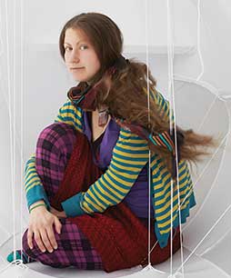 Nicole Banowetz sitting on floor