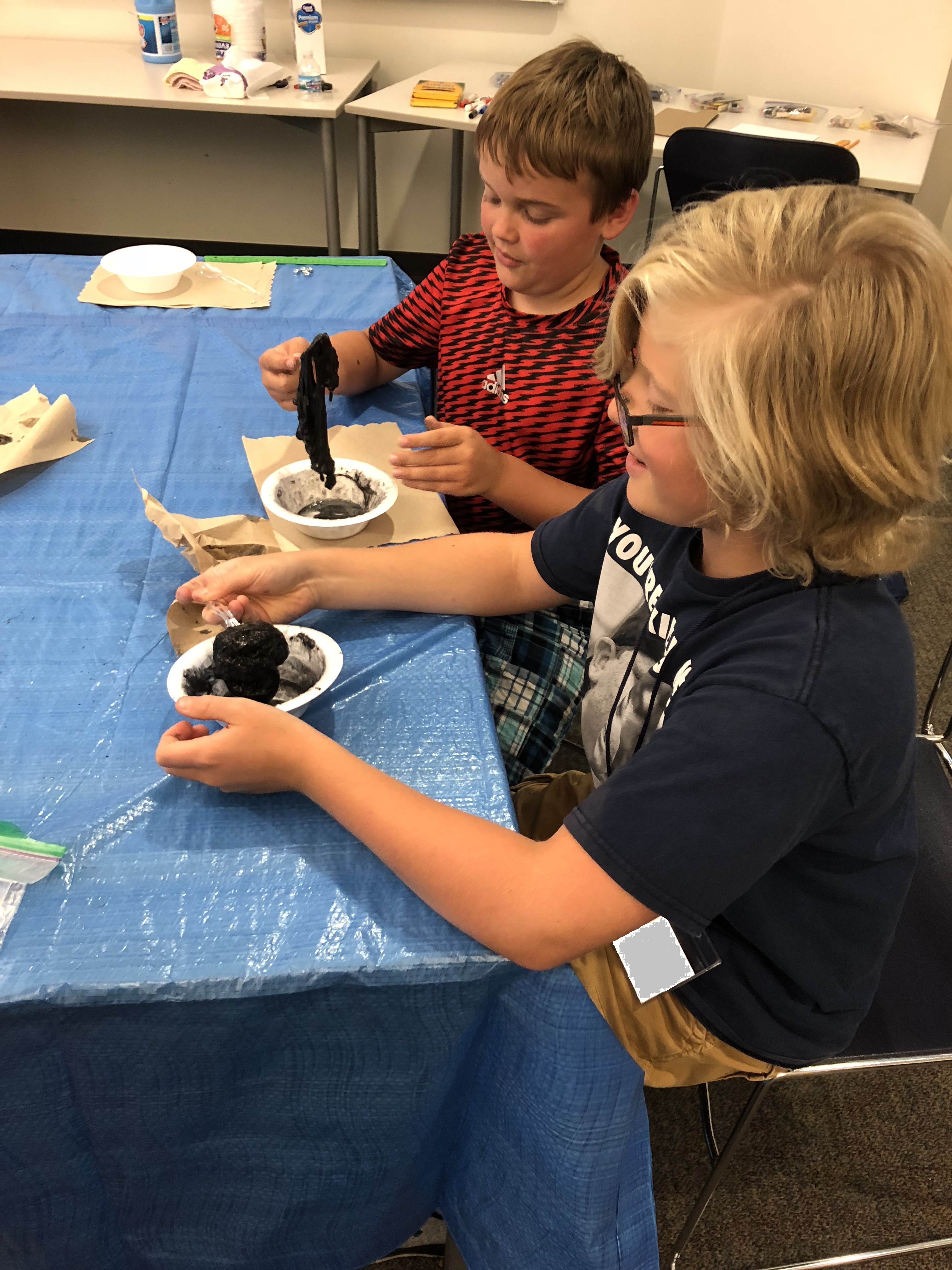 Students making magnetic slime.