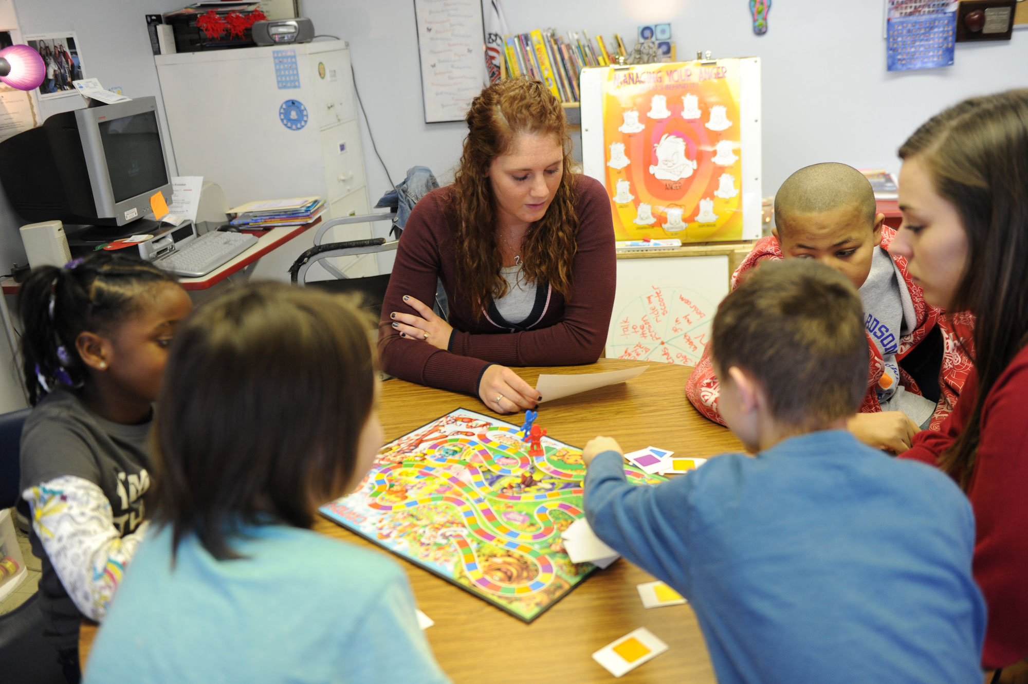 A teacher teaching students