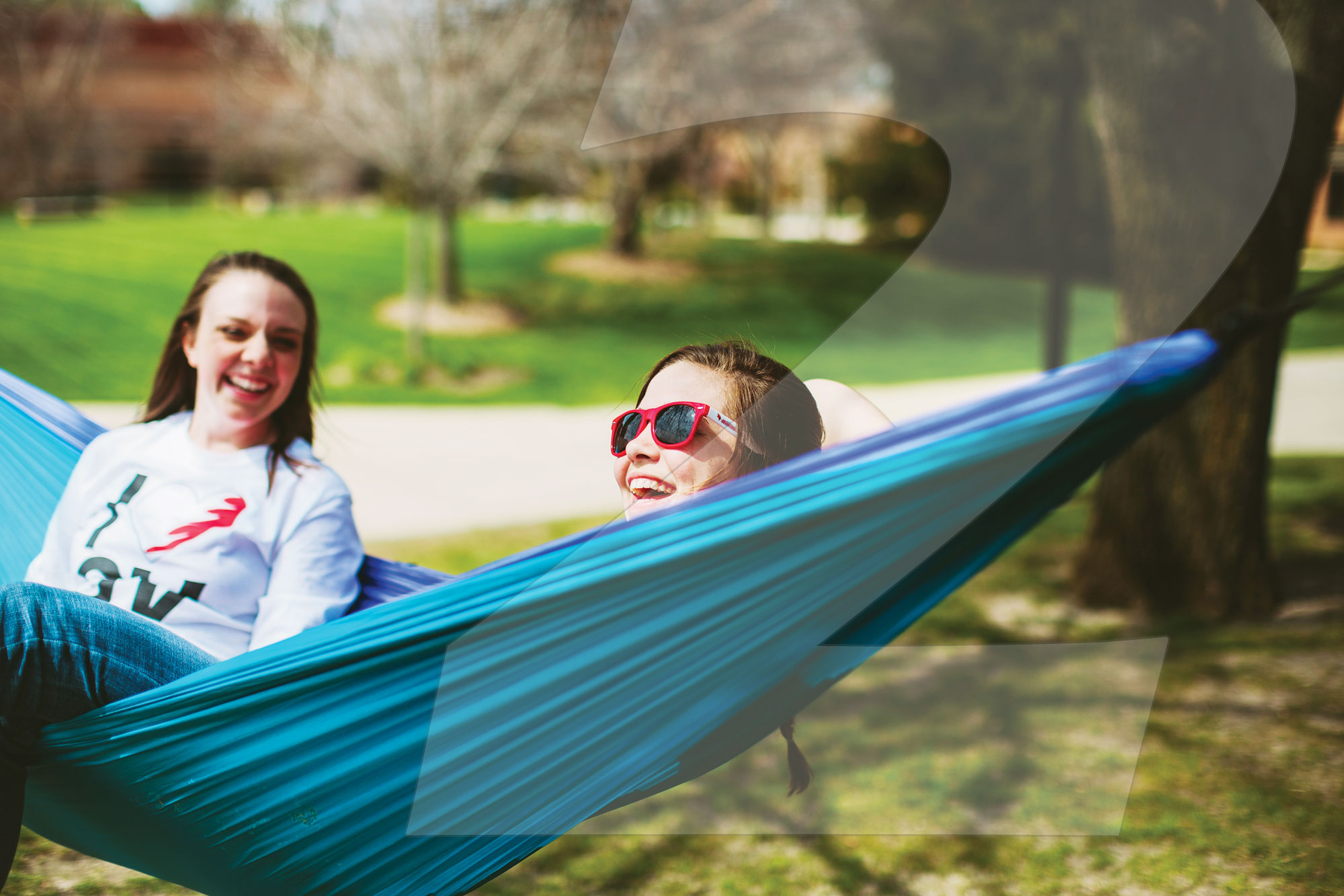 Two people in a hammock