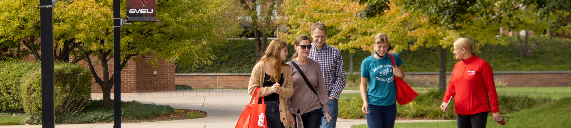 Family taking campus tour