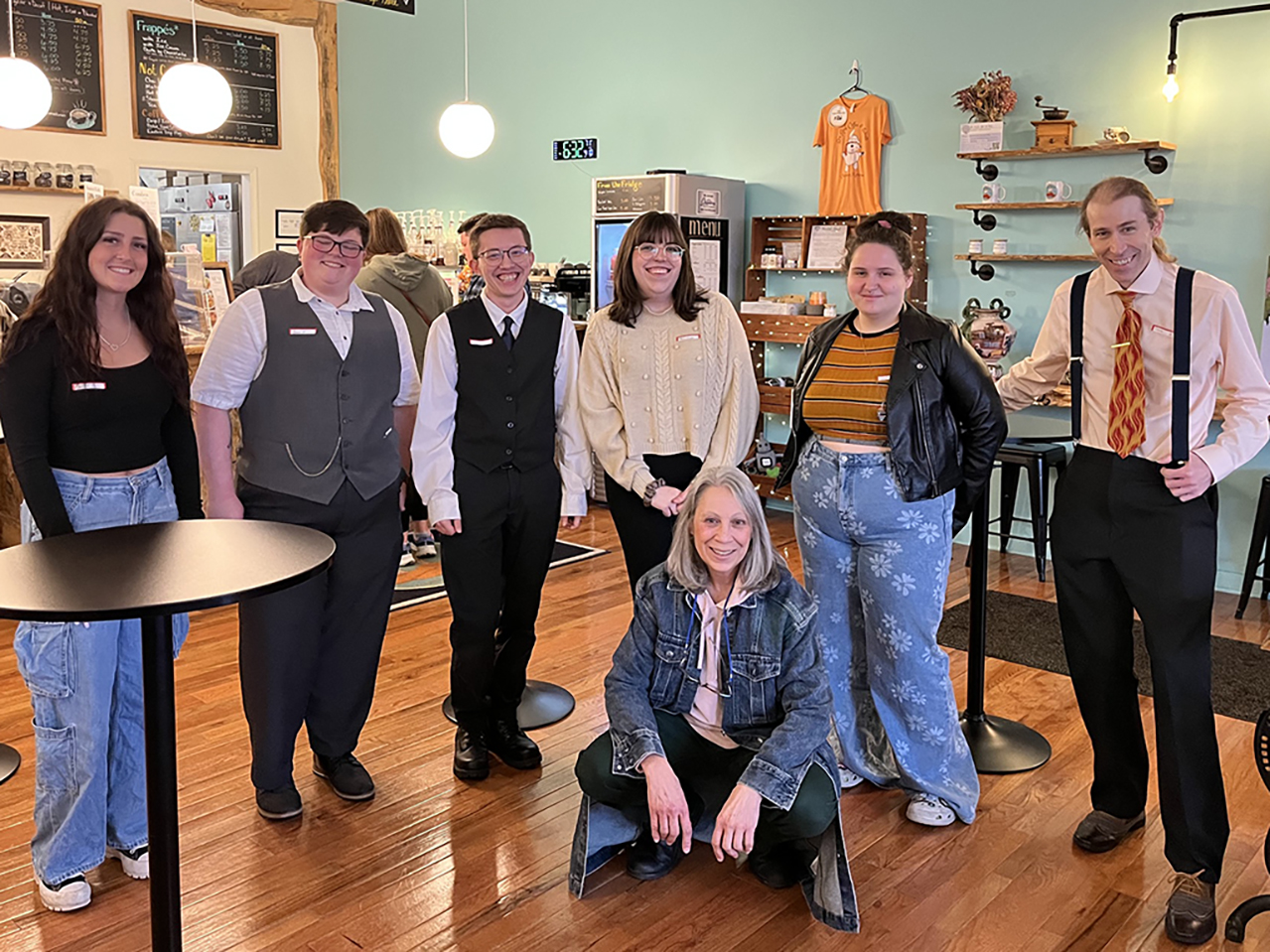 Exhibition artists from left to right: Jaden Gross,Quinn Navilynn, Alex Lorenz, Faith Schuyler, Rachel Wodierski, David  Andres, seated is instructor Andrea Ondish