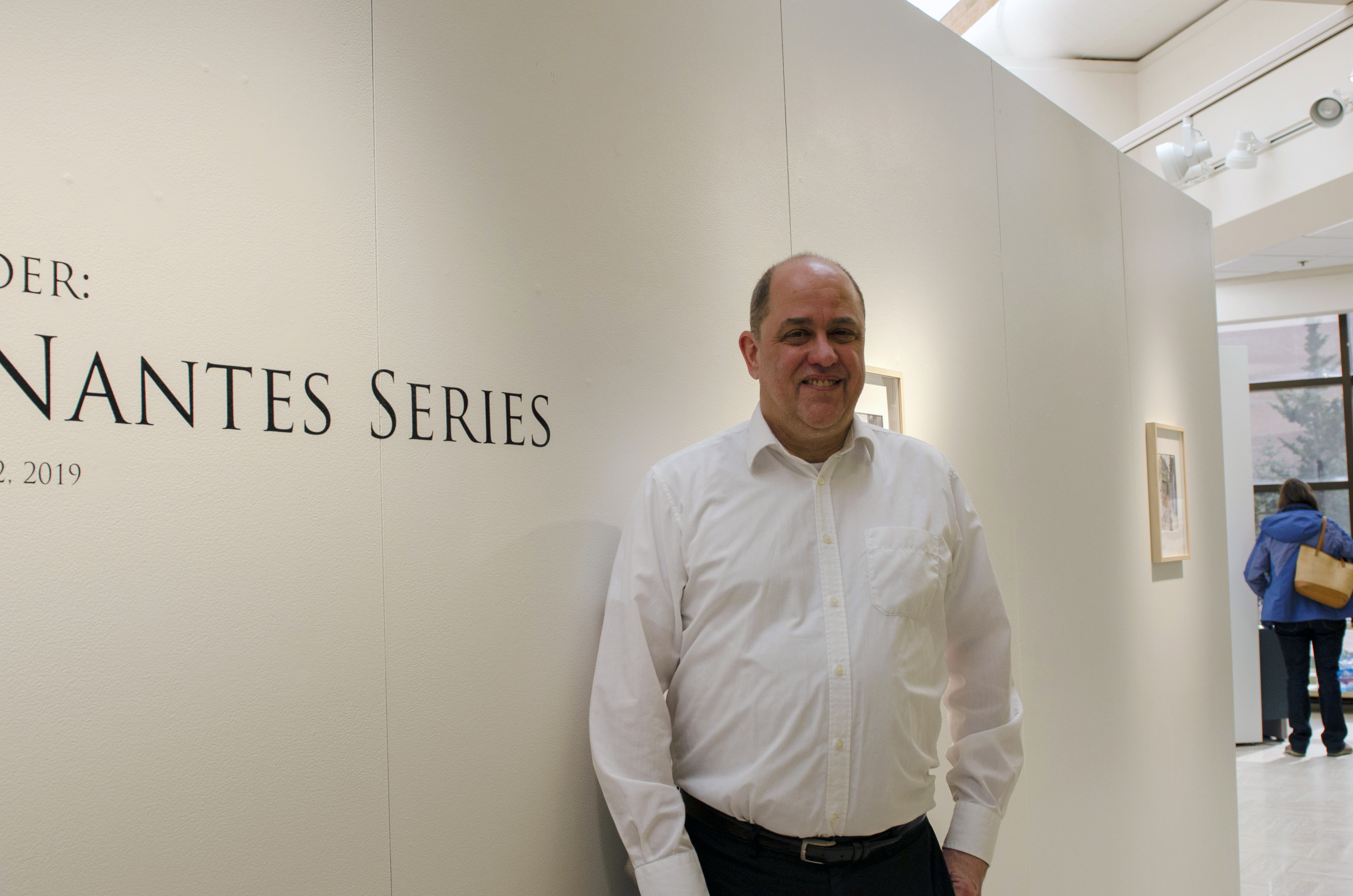 image of the artist next to the title of his exhibition, 'the nantes series'